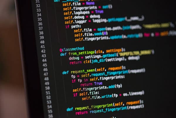 A close up of a computer screen showcasing a type of coding language
